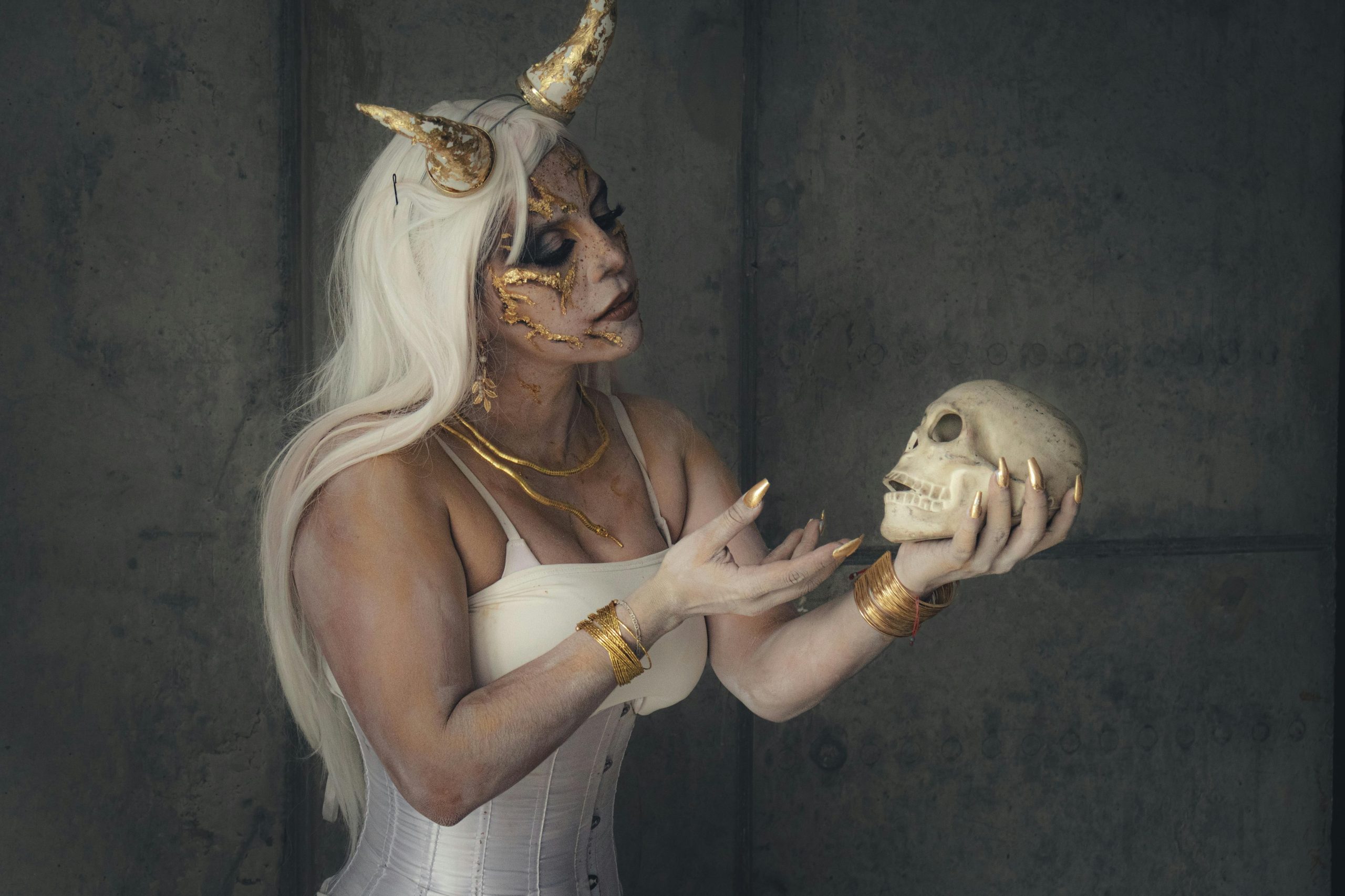 Instagram influencer wearing a detailed, fantastical Halloween makeup look