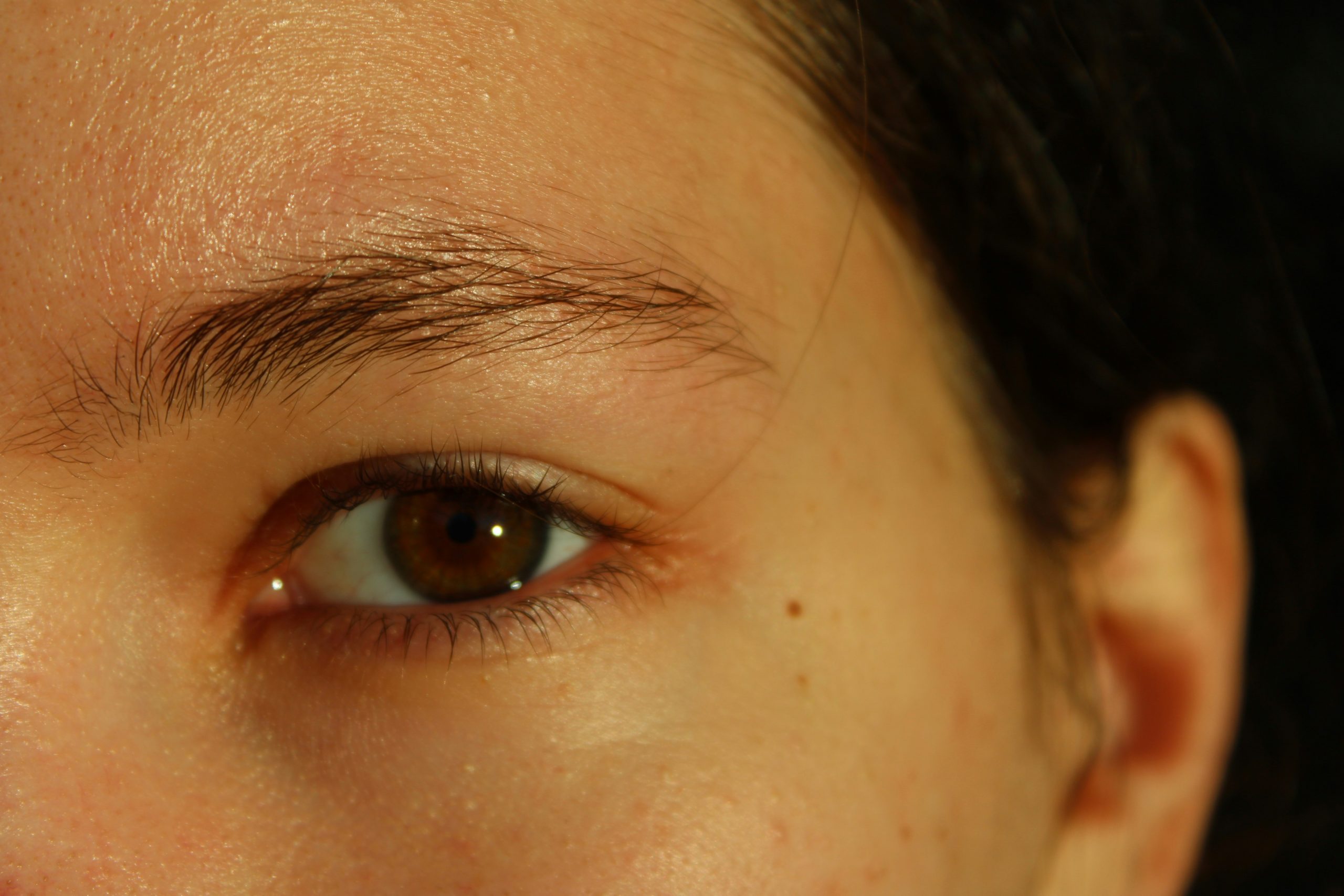 Close-up image of detailed stitched face scar makeup