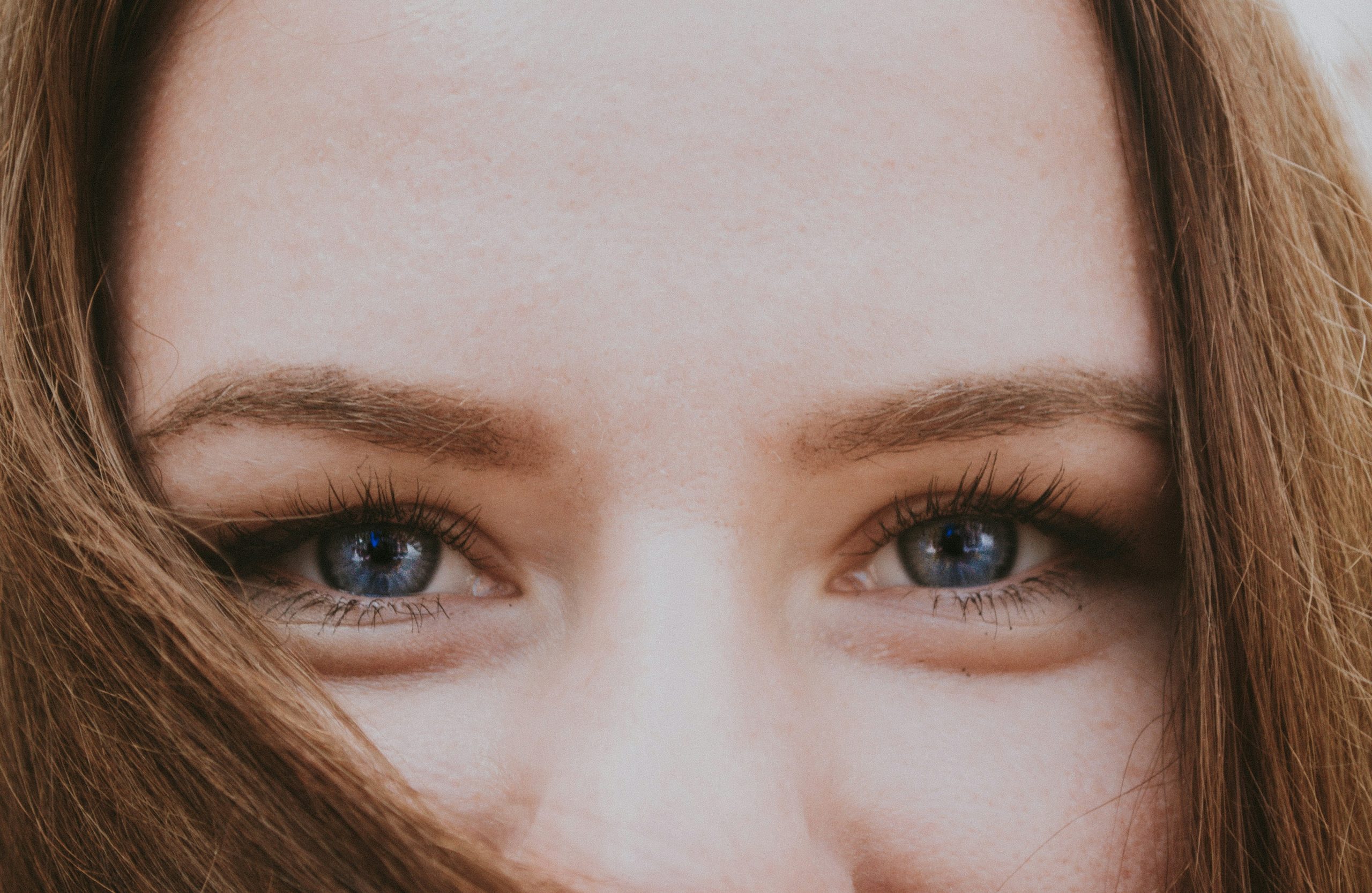 Closeup of hands featuring added age spots using makeup