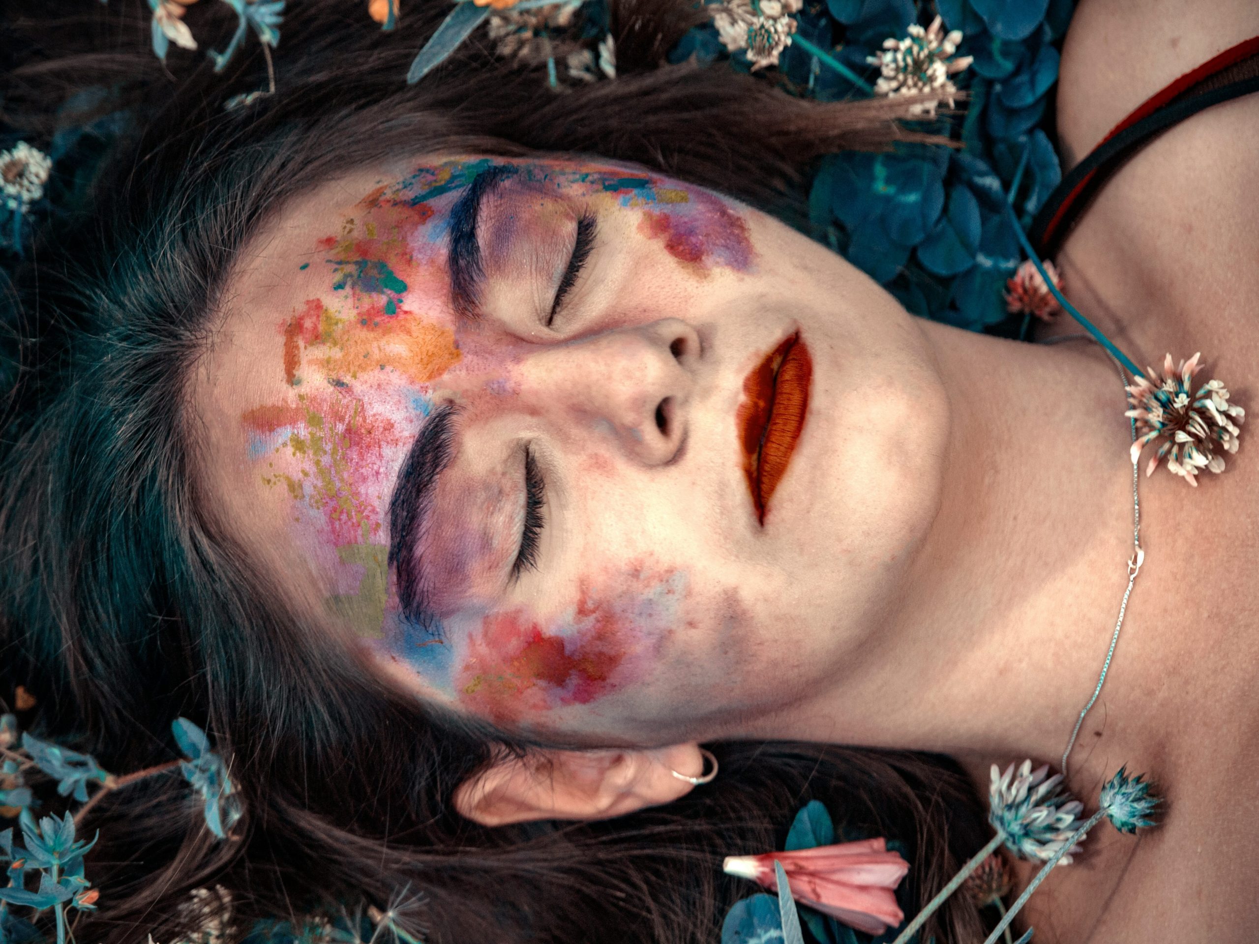 Collage of images showcasing surrealistic art and fantastical makeup inspiration
