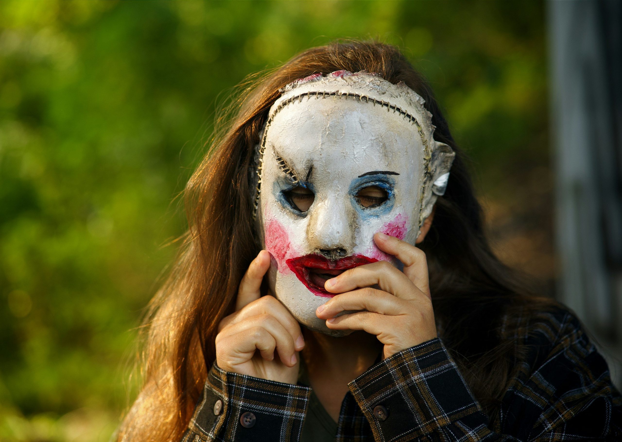 Harley Quinn inspired Halloween makeup featuring vibrant colors and bold lines