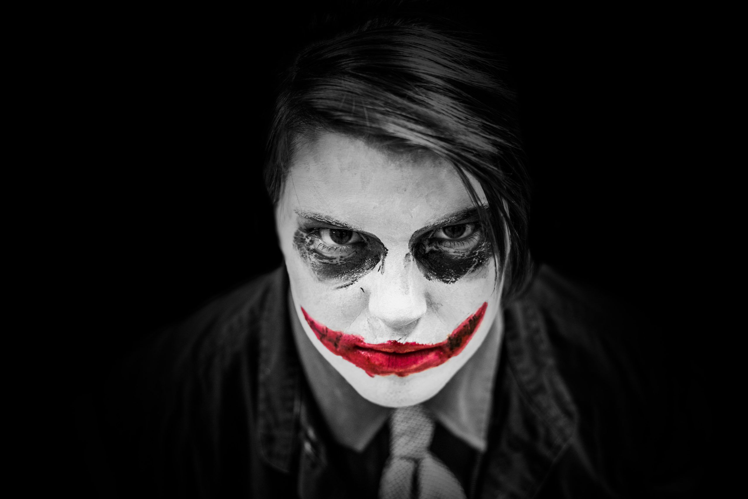 Man transformed into joker character with flawless makeup