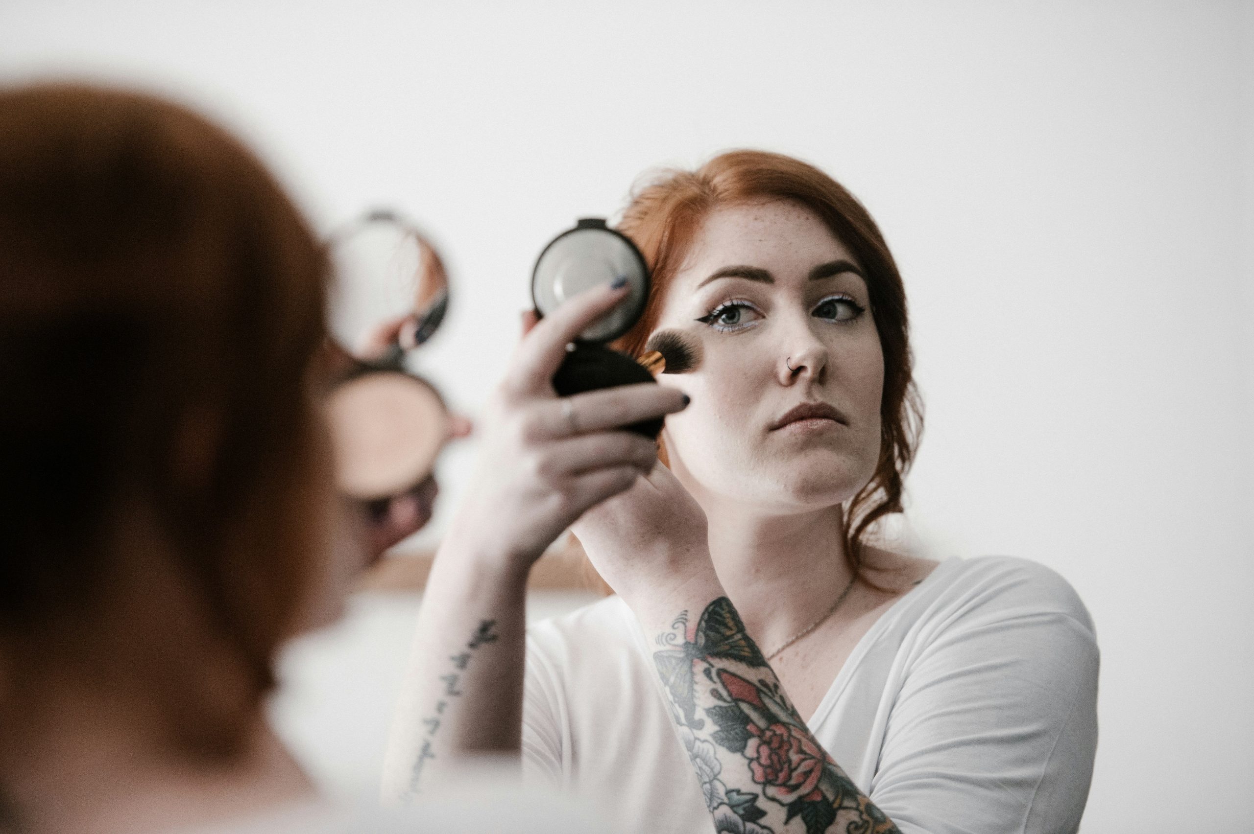 Process shot showing step-by-step application of Halloween makeup