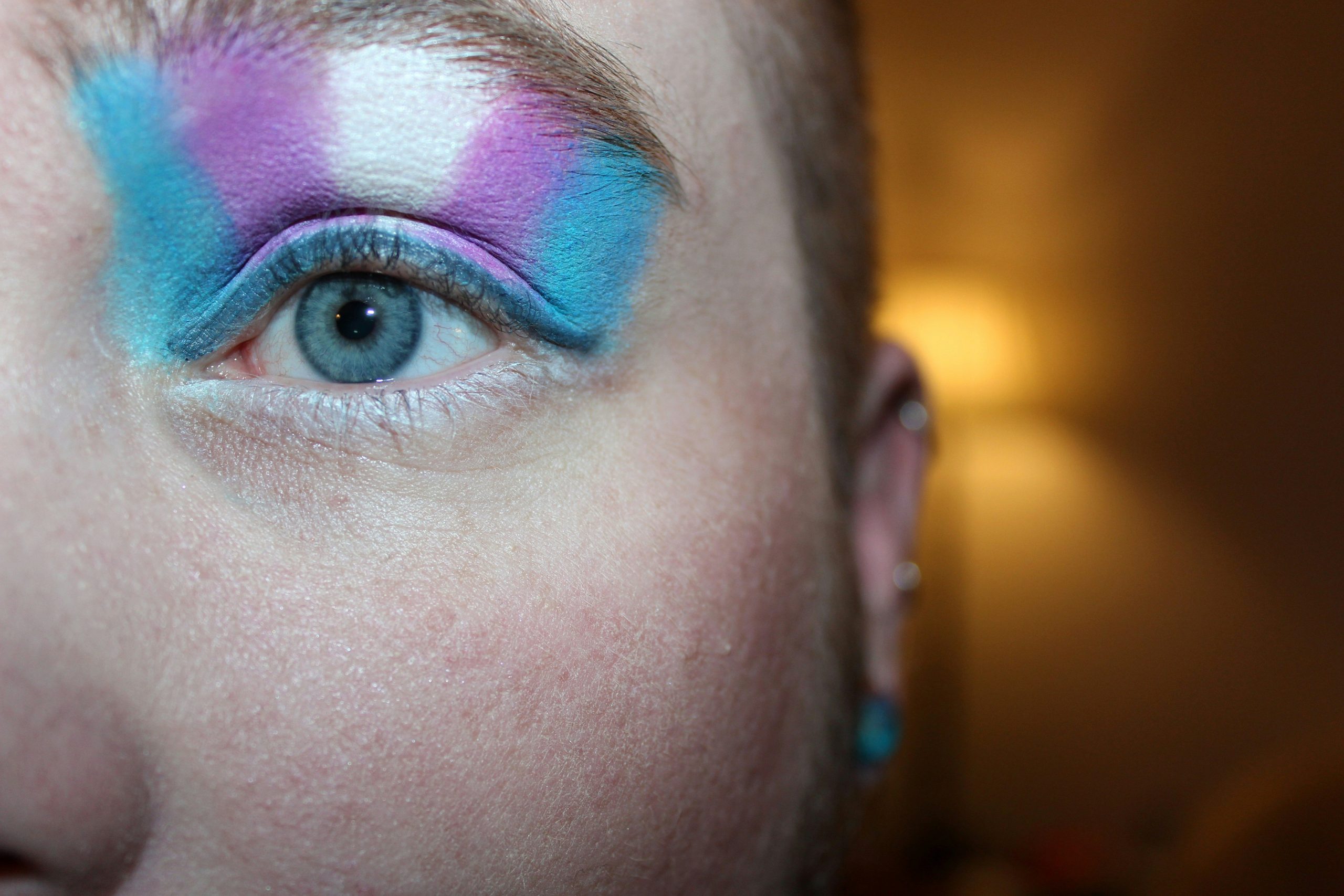 Three stunning examples of Halloween makeup inspired by classic stage makeup styles such as vampires, witches, and clowns.