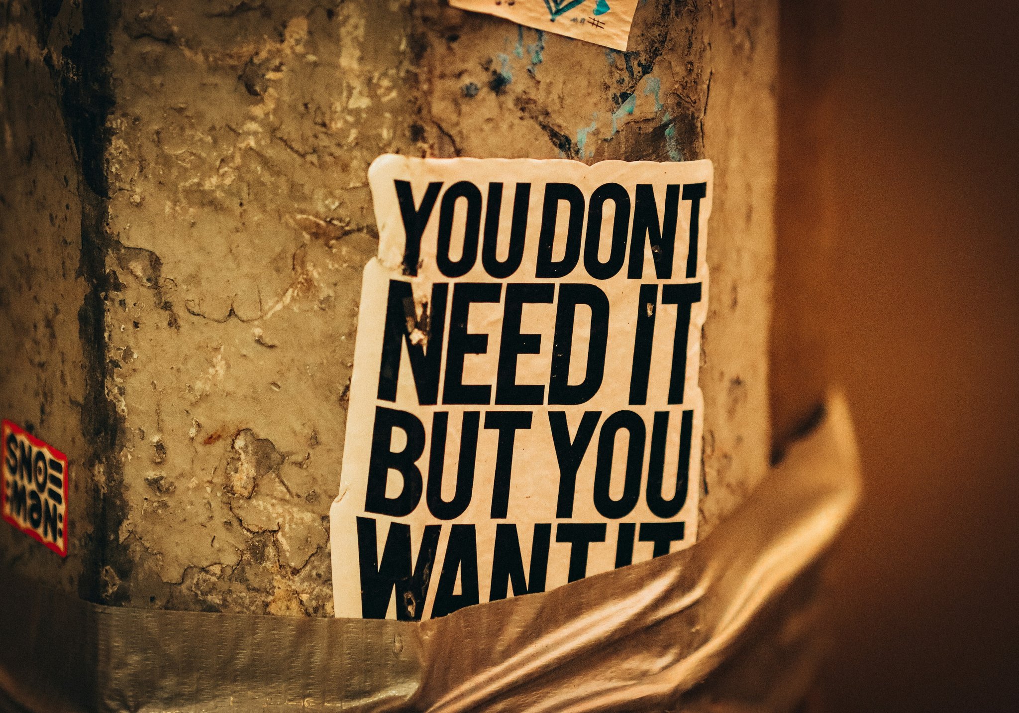 A makeup artist holding brushes and vibrant eyeshadows for fairy-inspired looks