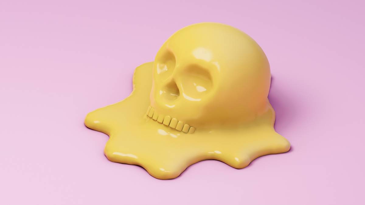 A model showcasing intricate skull makeup at a Halloween party