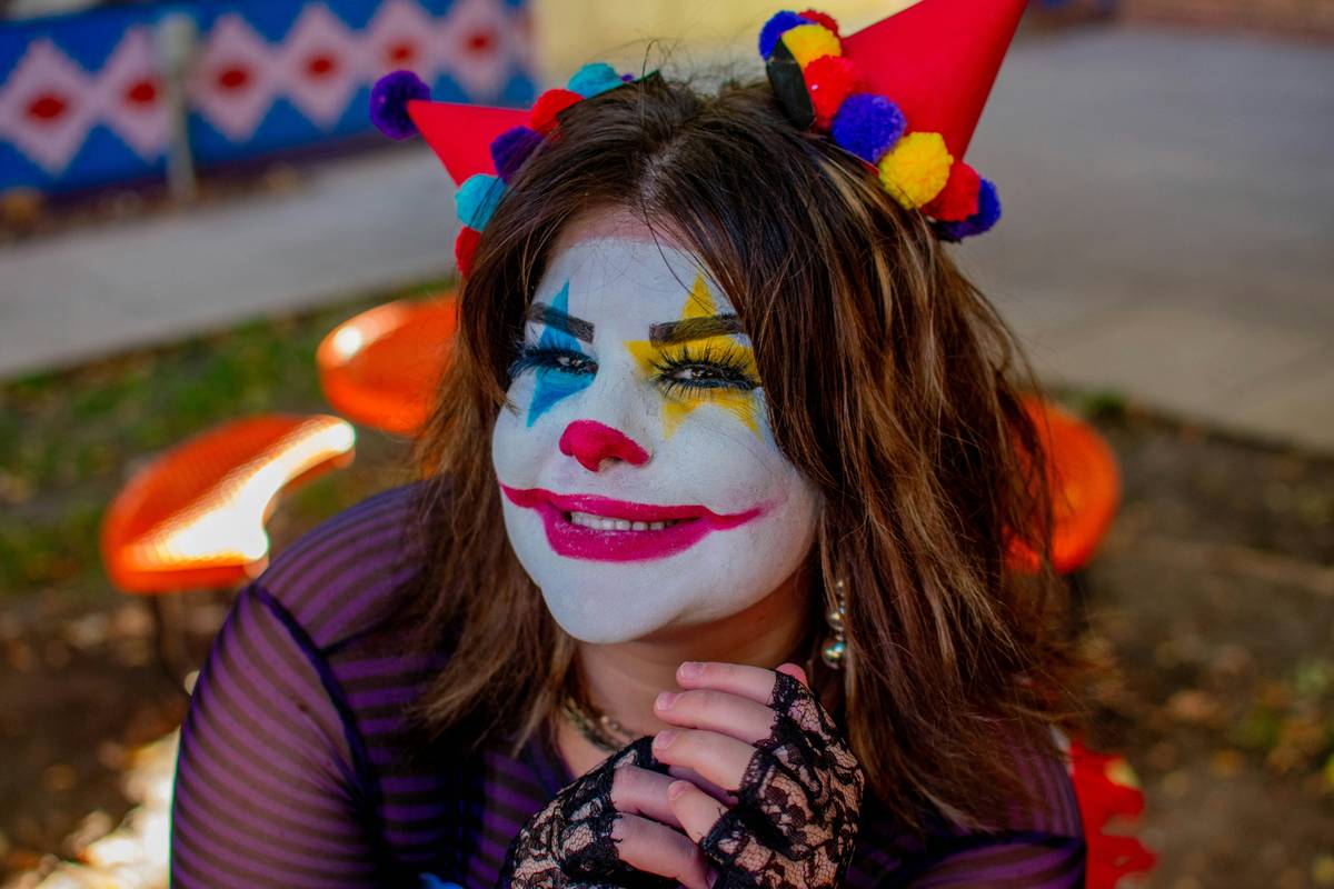 An example of a detailed zombie Halloween makeover featuring realistic wounds and dark shading.