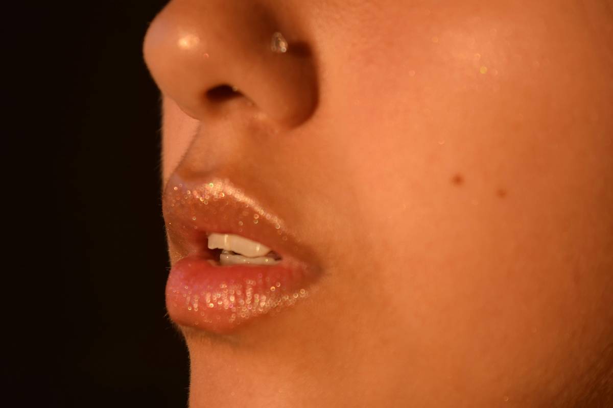 An example of stitched mouth makeup showcasing realistic stitches on lips.