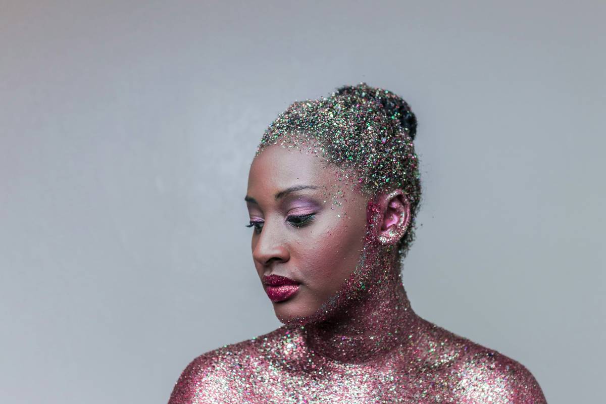 Close-up shot of someone using brushes to create dramatic Halloween eye makeup